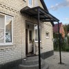 Навес с площадкой для входа в чердачное помещение.